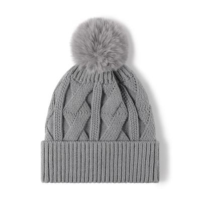 China COMMON Warm and stylish acrylic fleece-lined winter hat with faux fur pompom for sale