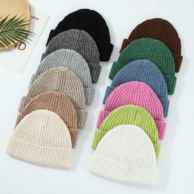 China COMMON winter outdoor casual simple solid color warm wool knitted cuffed beanie men and women's cold hat for sale