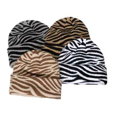 China COMMON winter new woolen hat warm casual cold hat striped zebra knit beanie mens for sale