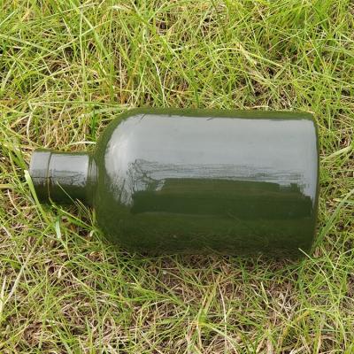 China Luxury Glass Bottles RSG Liquor Bottle Round Shape Army Green Coated Tequila 50cl Bottle 700ml Gin Colored Glass Bottle for sale