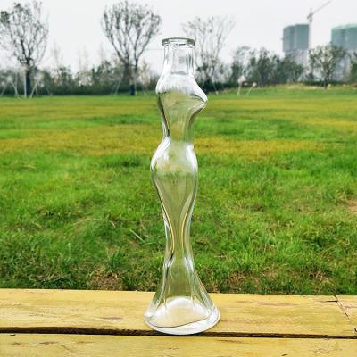 China Slim Base Shangdong RSG Glass Bottle Bespoke Gin Rum Brandy Empty Single Shaped Glass Bottle 300ml Body Shaped Glass Bottle for sale