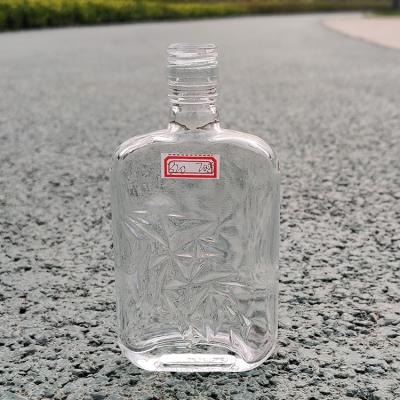 China Luxury Glass Bottles Wholesale Customized RSG Bottle Screw Cap Oblong Square Shape Empty Miniature Wine Bottle Engrave Enboss Glass Bottle 125ml for sale