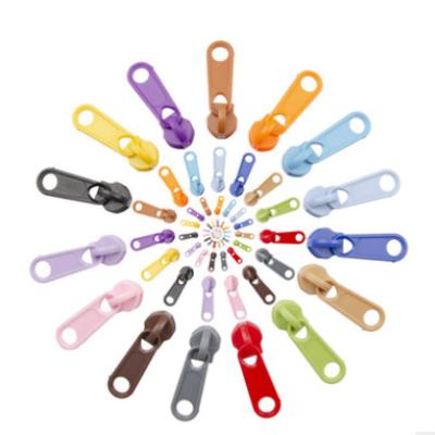 China Custom Nylon 3# and 5# Slider Nickel Free For PP And PE Zipper In Colored for sale