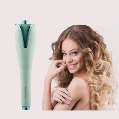 China Auto-rotate; Ceramic Band Heater Hair Curler With Negative Ion Barrel Clip Hair Care Wholesales Custom Logo Auto Rotating Curling Wand for sale