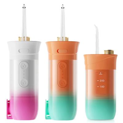 China 360 Rated Nozzle Electric Cordless Oral Dental Irrigator Teeth Water Flosser Teeth Cleaning for sale