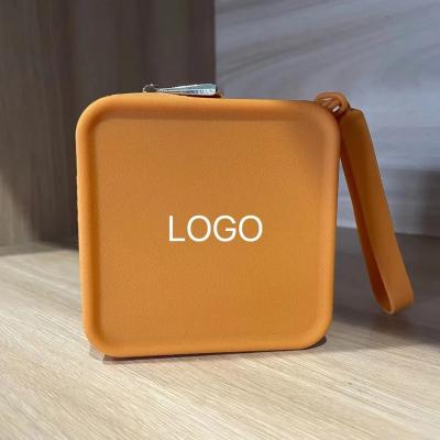 China Caja de almacenamiento de joyas personalizada Bolsa de maquillaje de silicona 100% de grado alimenticio para bolsas de chicas en venta