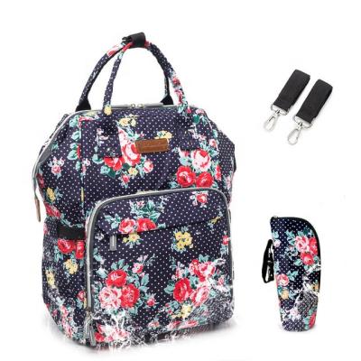 China Multi-functional Waterproof Baby Diaper Backpack Travel Backpack Anti-theft Packing Bag Large Capacity Bags With Floral Printing for sale