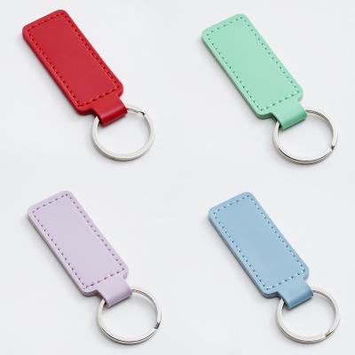 China 2023 Sublimation Personalized Key Chain Promotional Custom Material Key Holder Tag Spray Logo Eco - Friendly Gifts for sale