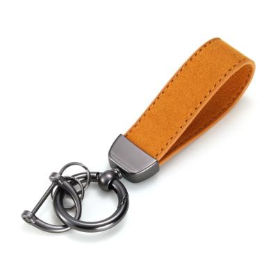 China 2023 Eco-friendly Materials PU Metal Custom Logo Car Key Indicator Top Fashionable Innovative Leather Key Chain for sale