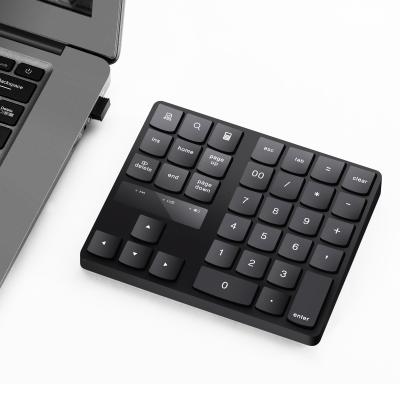 China 2.4G Number Pad 35 Keys Wireless Rechargeable Wireless Number Pad Radio Numeric Keypad With Nano Receiver for sale