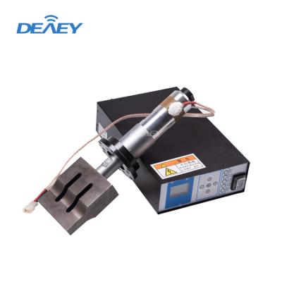 China Plastic Welders 20khz 2000W System Transducer Earloop Mask Trimming Machine Making 20khz Ultrasonic Generator for sale