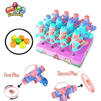 China Toy Candy With Delicious Candy normal promotional amusement gun flying toys for sale