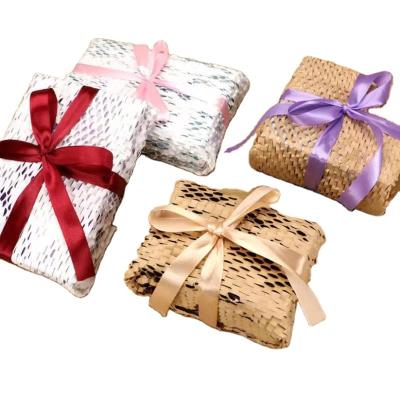 China Biodegradable Coil Wrapping Paper Cosmetic Wrapper Grid Paper Pad Environmental Protection Express Packaging Honeycomb Paper for sale