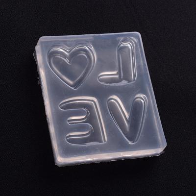 China Viable Mirror Crystal Epoxy Mold LOVE Shape Silicone Mold DIY Jewelry Ornaments Decoration Tools for sale