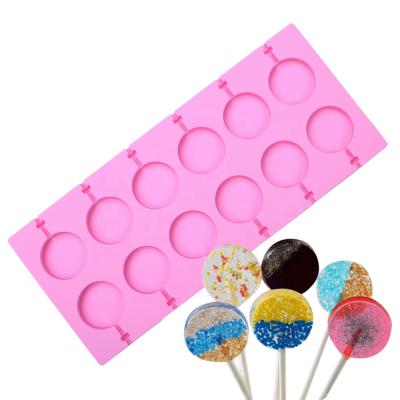 China Sustainable 12 Cavities Round Silicone Mold For Lollipop Chocolate Hard Candy Cake Decorating 12pcs Paper Stick for sale