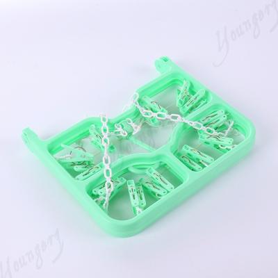 China Multifunctional Foldable Clip and Drip Hanger with 24 Clothes Pegs for sale