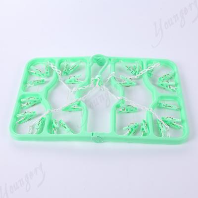 China New Folding Laundry Hanger Promotion Rectangle Hanger With 24 Clips for sale