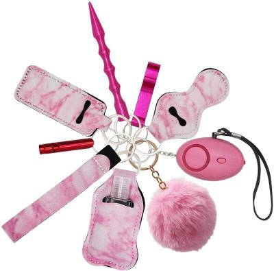 China TaiLai Eco-friendly Material Key Chain Set For Girls Women Safety Self Defense Alarm Kit Pom Pom Wrist Key Ring Self Defend Metal Key Chain for sale