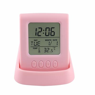 China BSCI 2021 Calendars Hot Selling Gift Pink Color Digital LCD Table Clock Mobile Phone Bracket Multifunction Design for sale