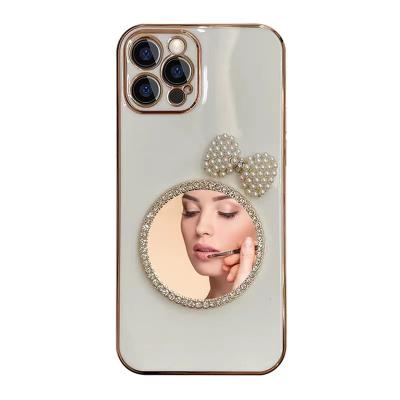 China Anti-fall TPU Soft Makeup Diamond Mirror Phone Case For iPhone 13mini Promax for sale