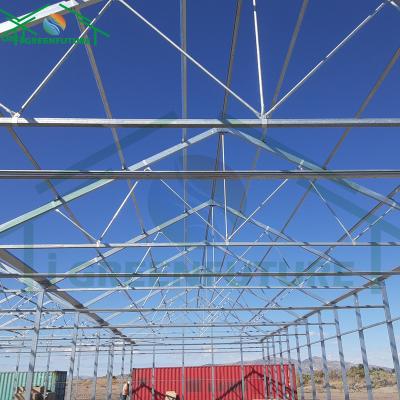 China Stable Structure Easily Assembled Single-Span Greenhouse Plastic Sheet Greenhouse For Tomatoes Plastic Tunnel Greenhouse On Sale for sale