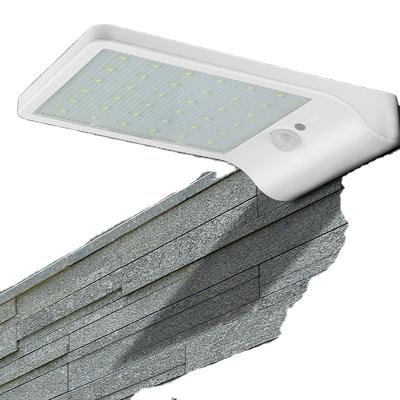 China Residential Solar Lamp Home Human Body Induction Wall Lamp Balcony 36led Outdoor Super Bright Solar Garage Door Lamp for sale