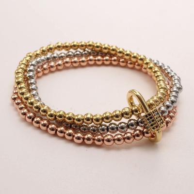 China Vintage 18k Gold Plated Beaded Bracelets Fashion Small Elastic Beaded Bracelet Bangles For Women Girls Newcomer for sale