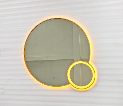 China Modern Luxury LED Lighted Bathroom Wall Mirrors Make Up Round Mirror With Orange Stainless Steel for sale