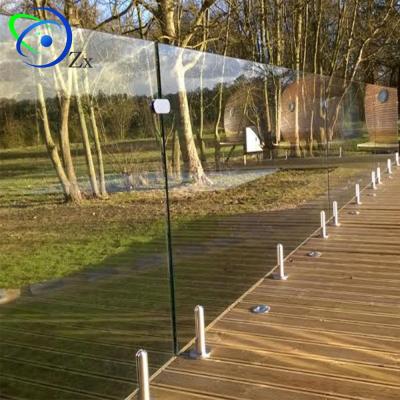 China Modern Frameless Deck Balcony Railing Glass Fence Mounted With 2205 Stainless Steel Pin Railings SS 316 Glass Fence Panels for sale