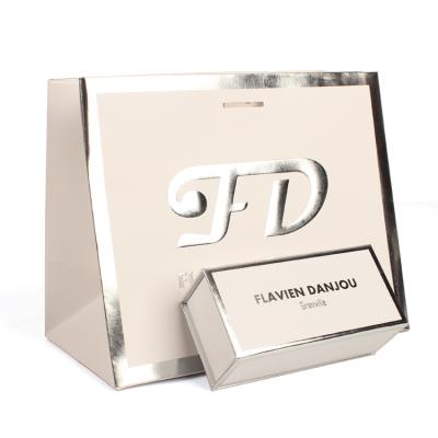 China Zhuoyida Recyclable Custom Logo Printed Silver Foil Stamping And Embossing Shopping Paper Bag With Your Own Logo for sale