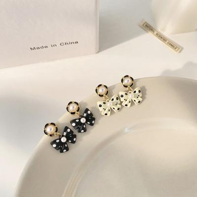 China ODM New Polka Dot Bow Pearl Earrings Insist Jewelry Winter Durable 925 Silver Needle Dangle Earrings For Female for sale