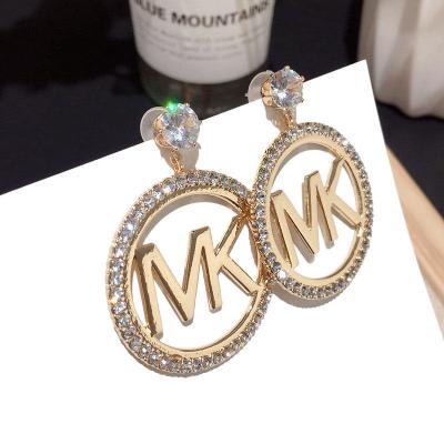 China Fashionable Queen New Gold Plated Alphabet Luxury Zircon Circle Initial Letter Earrings for sale