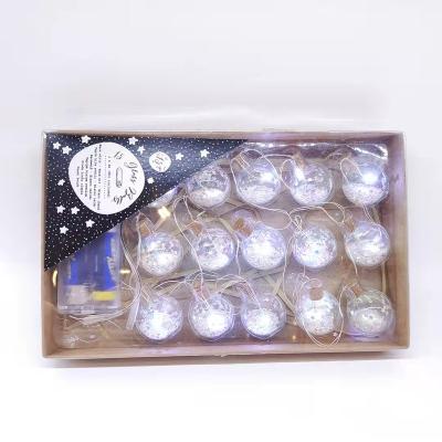 China Home Decorations Gifts Christmas Ball Transparent 15 Glass LED Head Lamp With Filling Exquisite Decoration for sale