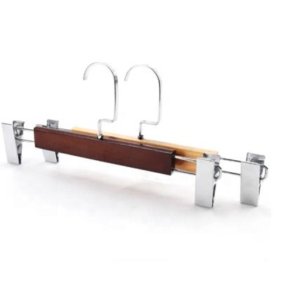 China High grade luxury anti-slip space-saving solid wood pants hanger with metal clips with different size for clothes for sale