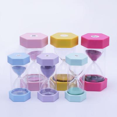 China Art Decor Wholesale 15/30 Minutes Sand Timer Glass Custom Hexagon Sand Logo Plastic Acrylic Hourglass for sale