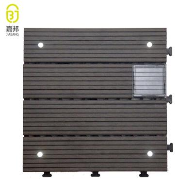 China Automatically Light At Night CE Certificate Vitrified Tiles Price WPC Solar Decking Flat Roof Tile , Exterior Decking Tiles For Patio for sale