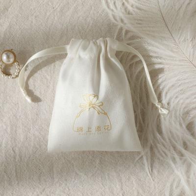 China Aseptic manufacturing wholesales custom logo bracelet ring jewelry small cord velvet bag for sale