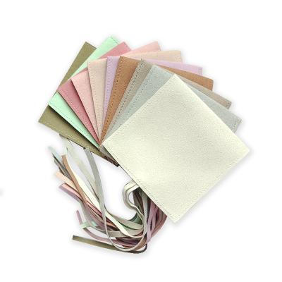 China Cheap Fin Price In Stock Microfiber Jewelry Packaging Bags Small Envelope Fin Velvet Suede Cloth Pouch for sale