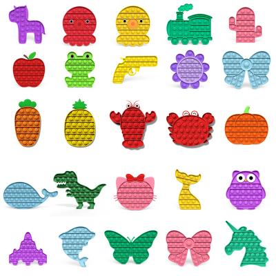 China Silicone Amazon Gifts Fashionable pop push toy popping person fidget toys set relaxation silicone radish pineapple pumpkin fidget sensory toy for sale