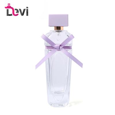 China Fashionable Devi New Design 100ML Glass Perfume Bottles Empty Lady Parfum Bottle Refillable Perfume Sprayer Atomizer Purple Bow Container for sale