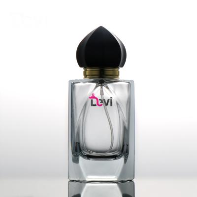 China Devi Glass Perfume Bottles 100ML Modern Unique Mens Perfume Bottle Perfume Sprayer Atomizer Empty Container Packaging Custom Design for sale