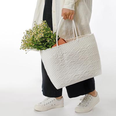 China 2021 New Beach Bag PORTABLE Wholesale Handwoven Handwoven Bag PE Material Handbag for sale