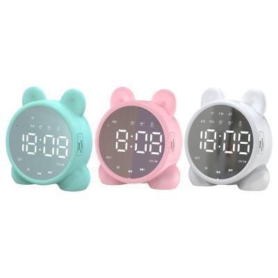 China Portable Tooth Speaker Alarm Clock Digital Display Radio Blue Touch Sensor for Bedroom Kids Sleeping Bedside for sale