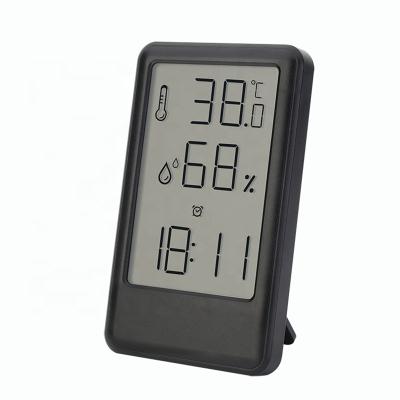 China New style ABS large-screen LCD display alarm clock table hanging 9032 dual-use temperature and humidity measurement for sale