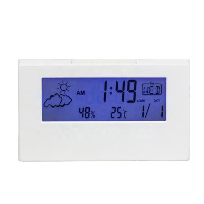 China Blue Weather Station Backlight Digital LCD Alarm Clock Time Thermometer for sale