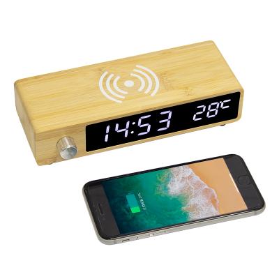 China 2021 Wholesale Minimalist Modern Bamboo Digital Button Alarm Clock Wooden USB Factory Charger Protection LED Acrylic Wireless Table Clock for sale