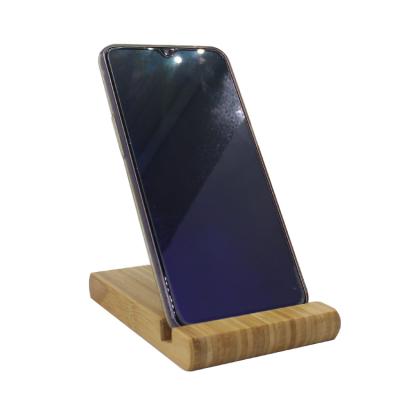 China Creative Smart Phone Furniture Portable Wireless Cell Phone Bracket Bedside Bedroom Wooden Decoration for sale