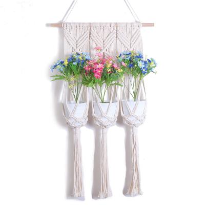 China NG7649 Northern Europe Handmade Tapestry Woven Bohemian Floral Hanging Baskets Home Decoration Hanging Baskets For Placing Potted Plants for sale