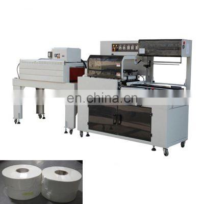 China Automatic maxi roll paper shrink wrap machine for sale