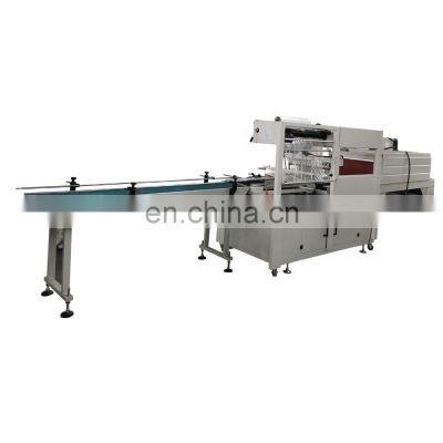 China Automatic maxi roll paper shrink packing machine for sale